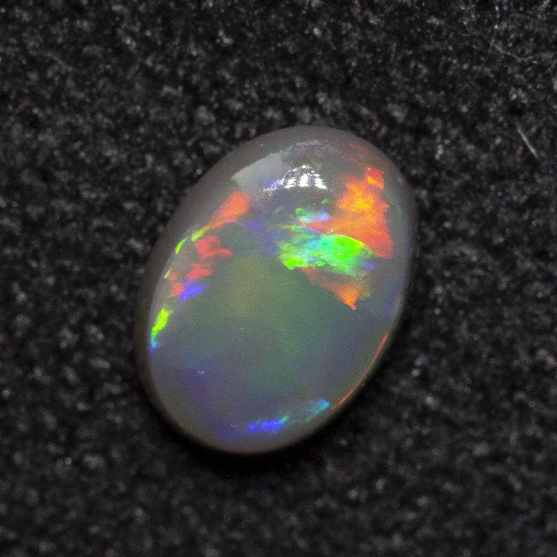 0.23 ct dark opal 4.9x3.6x2mm