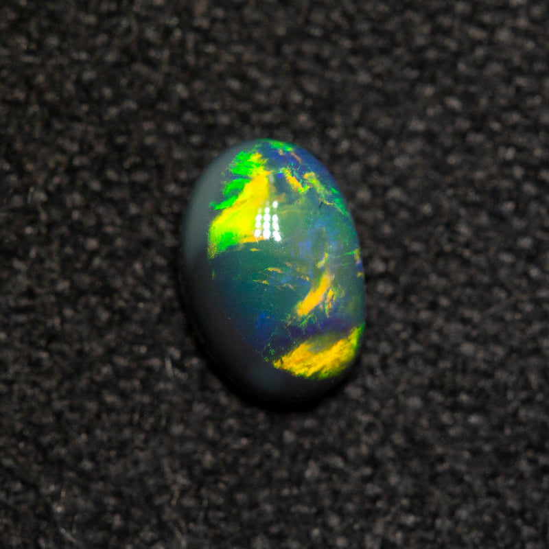 0.23 ct black opal 5.1x3.5x2.1mm