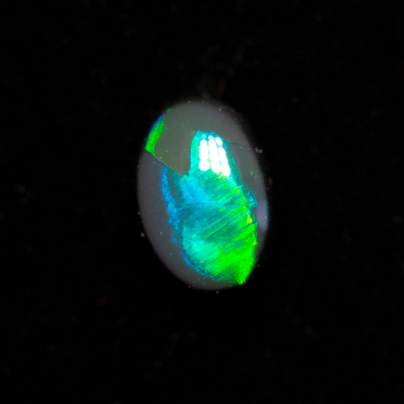 0.31 ct black opal 5.1x3.6x2.5mm