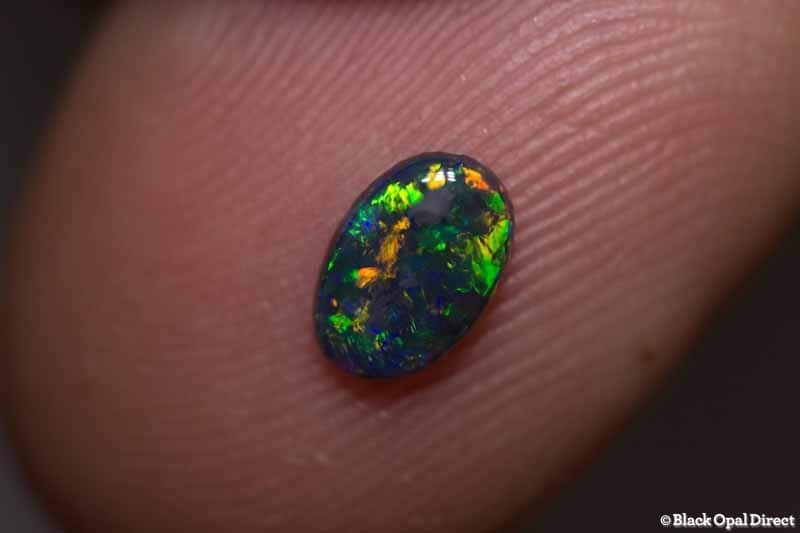 0.31 ct black opal 7x4.5x1.5mm