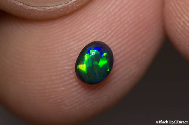 0.34 ct black opal 5x4x2.5mm