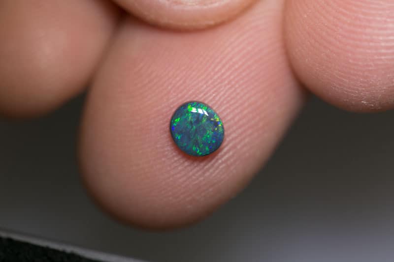 0.34 ct black opal 5x4.5x2mm