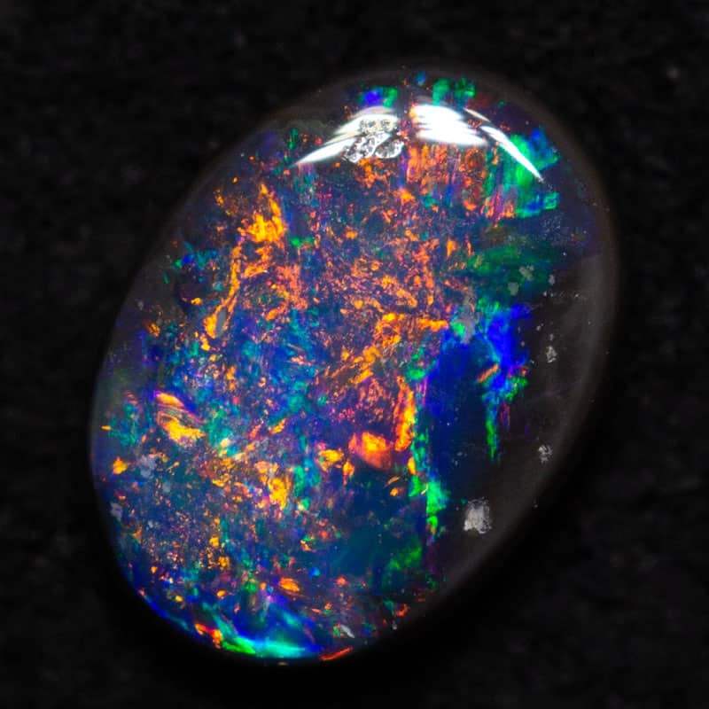 0.34 ct black opal 6x4.5x1.7mm