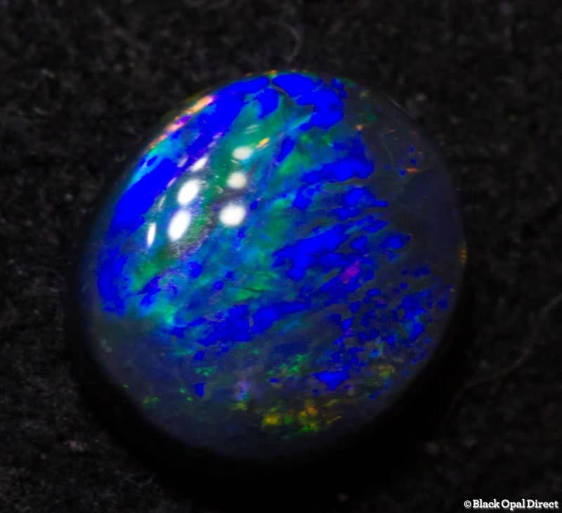 0.35 ct black opal 5.5x5x2mm