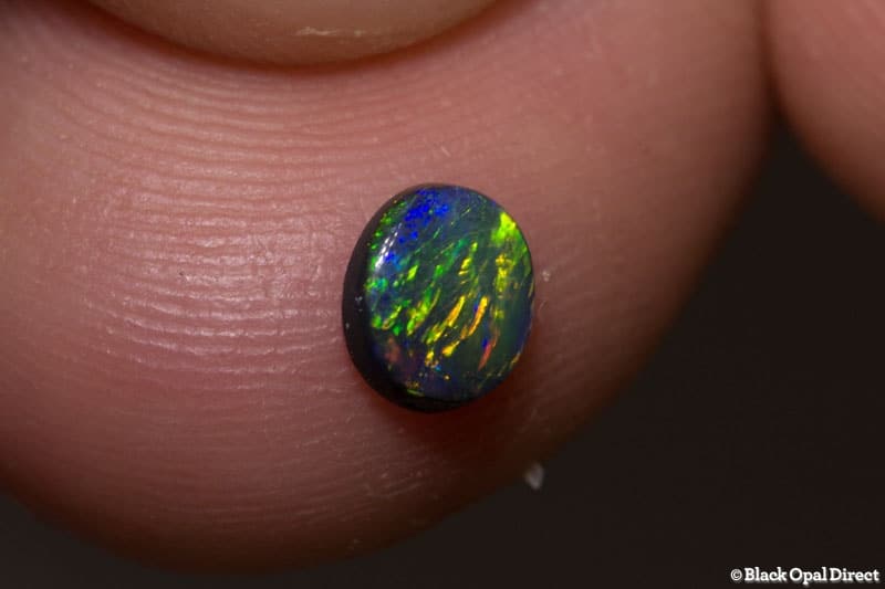 0.35 ct black opal 5.5x5x2mm