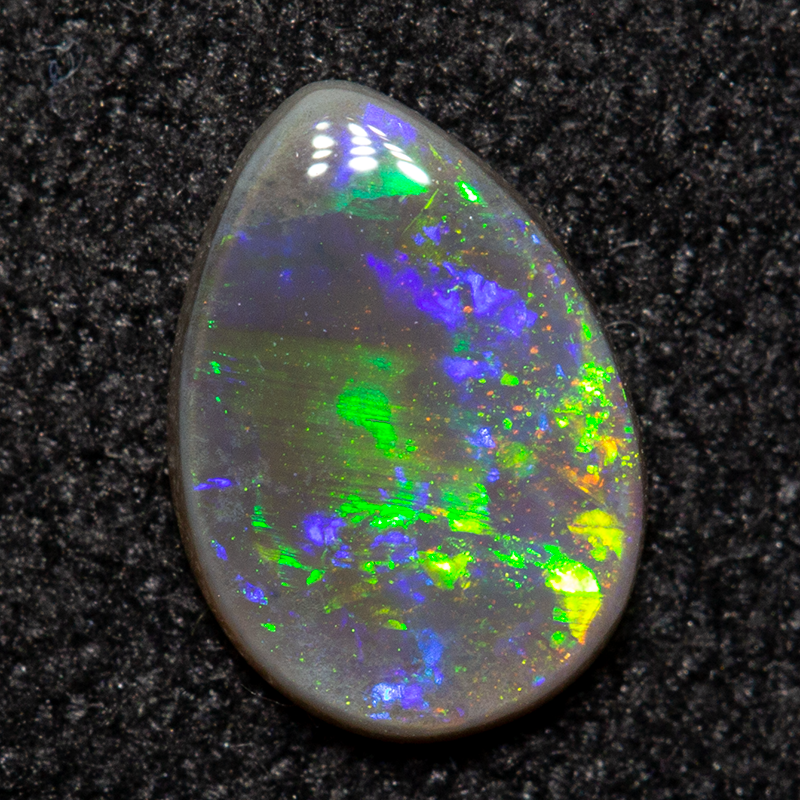 0.37 ct dark opal 7.2x5.3x1.5mm