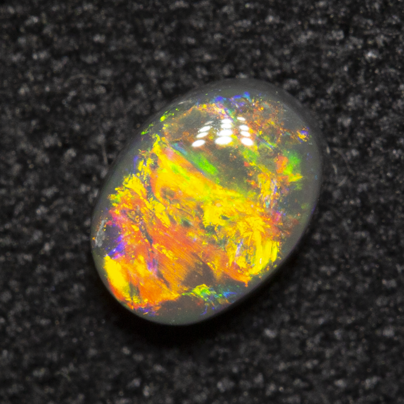 0.37 ct dark opal 5.4x4.1x2.3mm