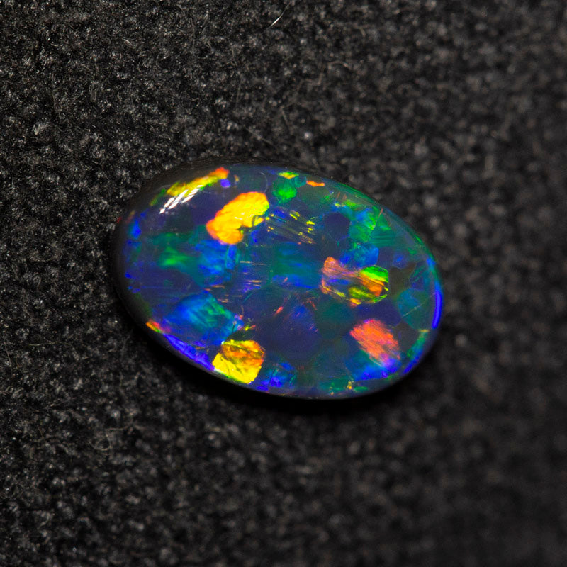 0.38 ct black opal 7x4.5x1.7mm