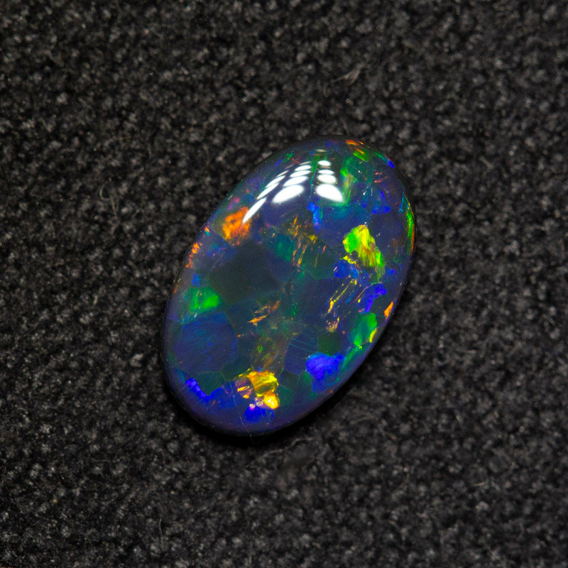 0.38 ct black opal 7x4.5x1.7mm