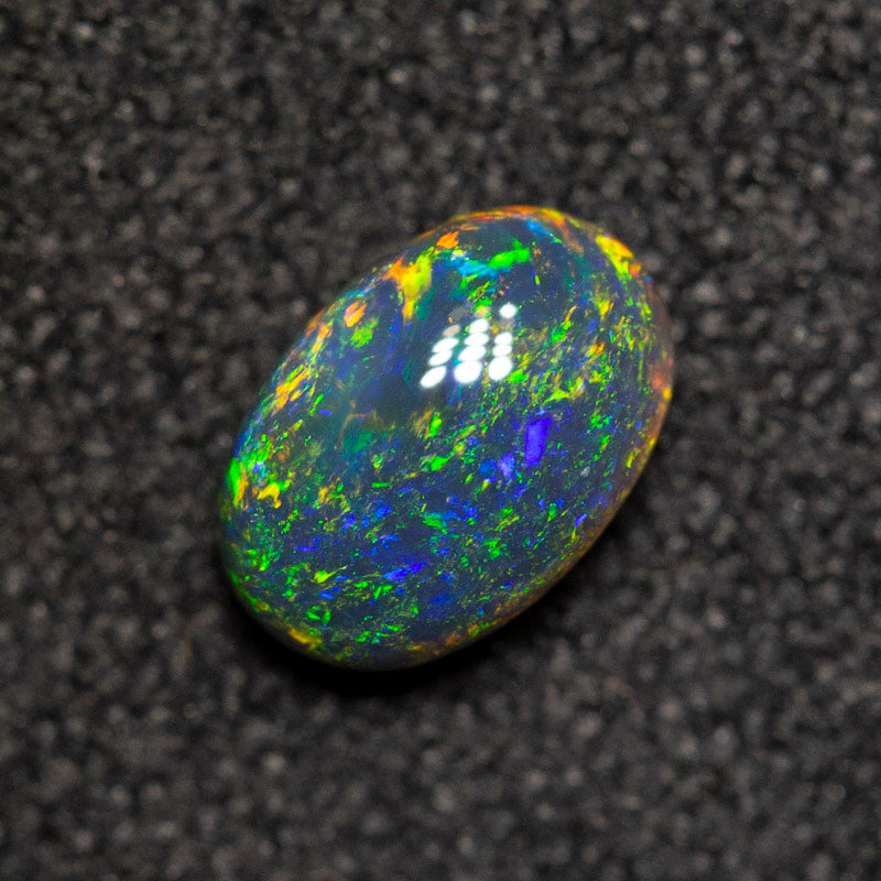 0.39 ct black opal 6x4.1x2.5mm