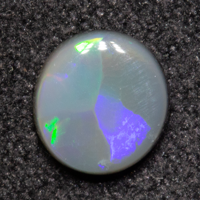 0.39 ct dark opal 5.6x5.2x1.8mm