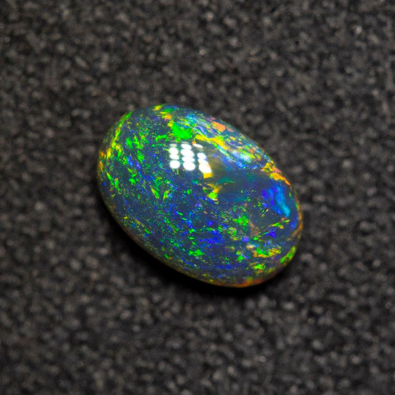 0.39 ct black opal 6x4.1x2.5mm