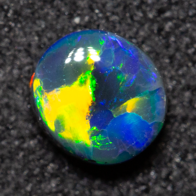 0.40 ct black opal 4.7x4.2x2.7mm