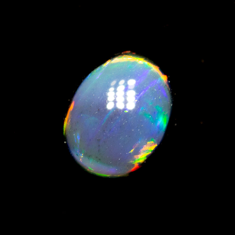 0.40 ct black opal 5.4x4.4x2.5mm