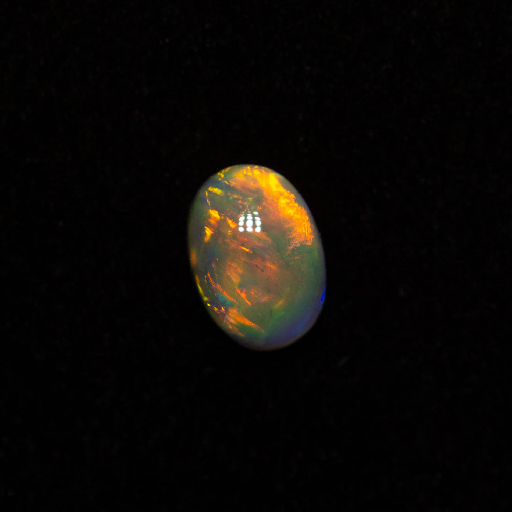 0.40 ct dark opal 5.9x4.2x2.6mm