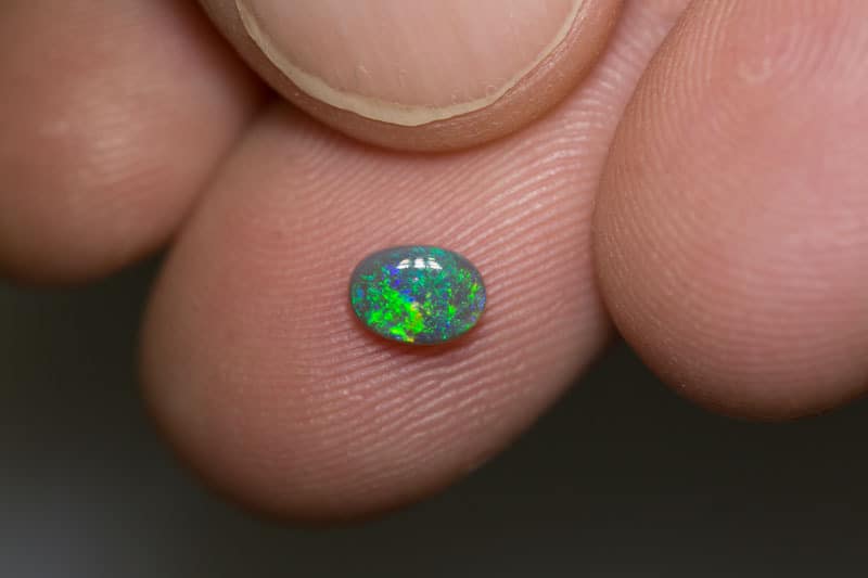 0.40 ct dark opal 6x4x2mm