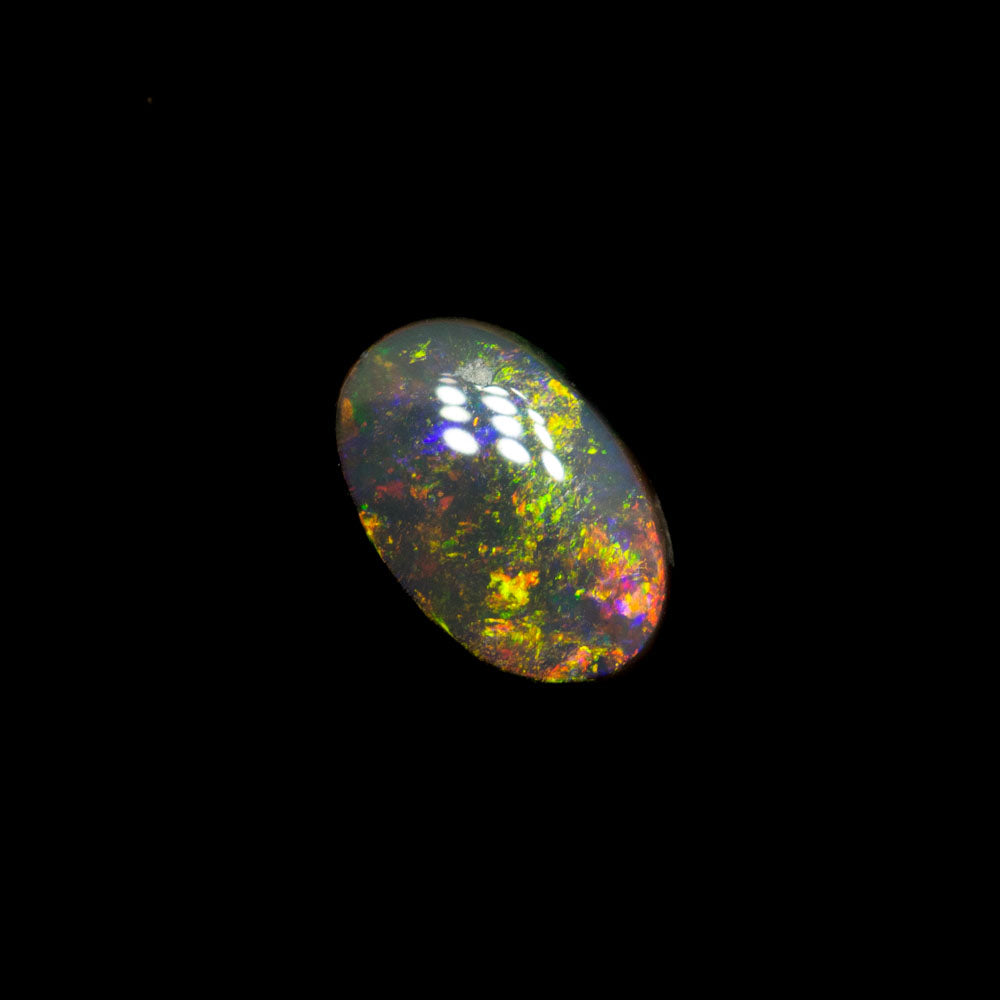 0.41 ct dark opal 6.2x4.1x2.2mm