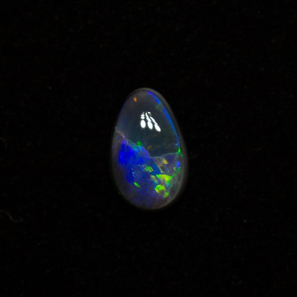 0.42 ct black opal 6.4x4.1x2.5mm