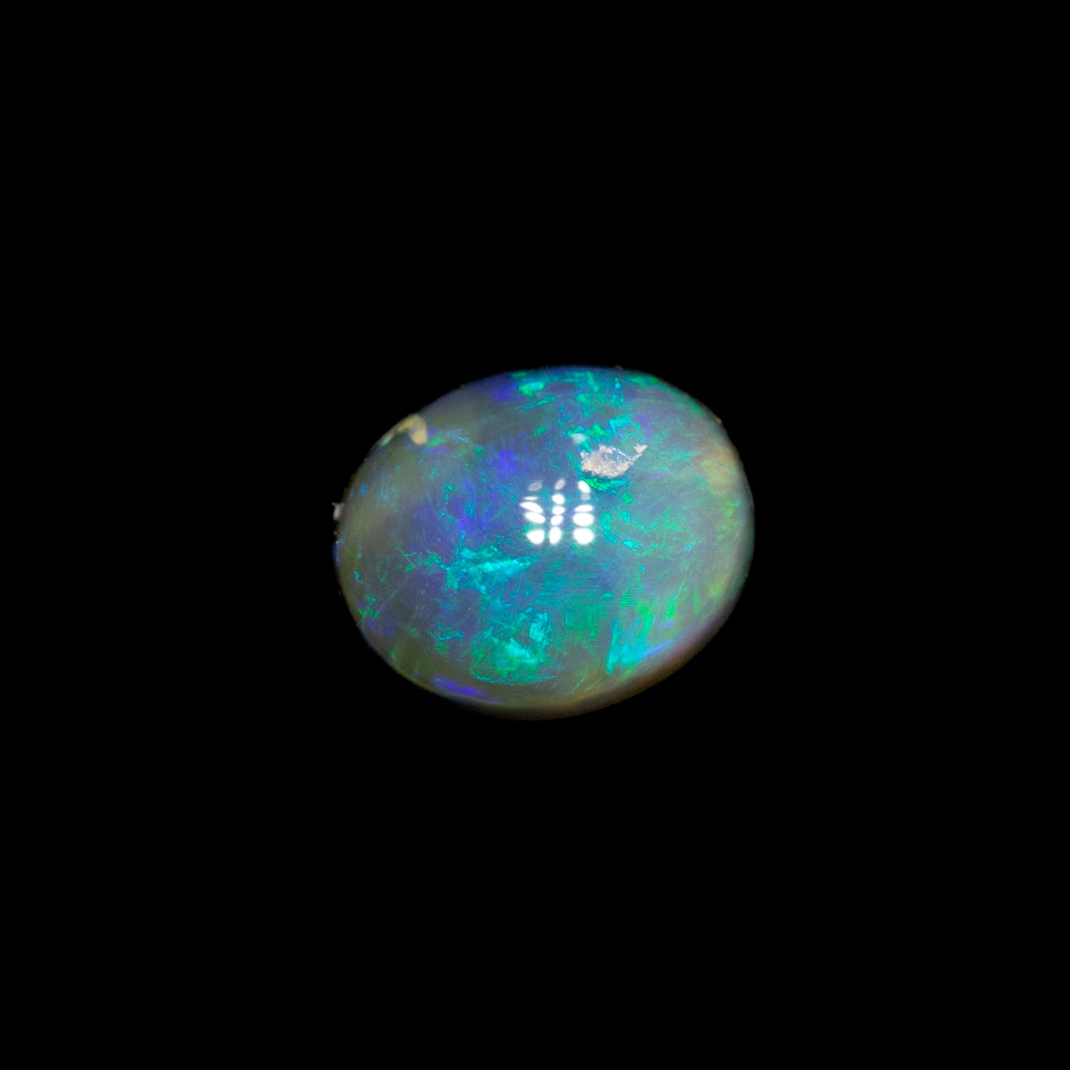 0.42 ct dark opal 5.5x4.5x2.8mm
