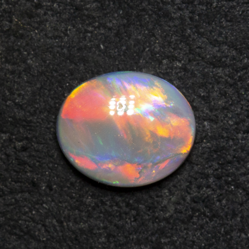0.43 ct dark opal 6.1x5.1x2.3mm