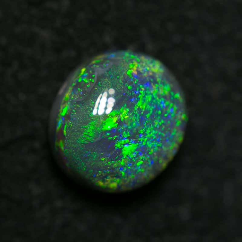 0.43 ct black opal 5x4.5x2mm