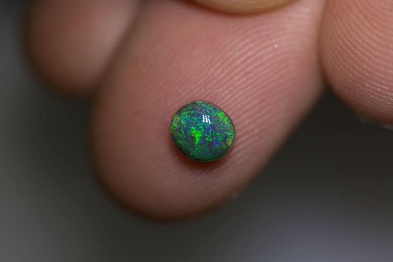 0.43 ct black opal 5x4.5x2mm