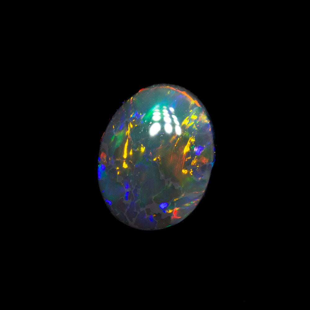 0.46 ct black opal 5.7x4.4x2.7mm