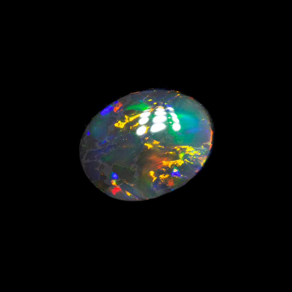 0.46 ct black opal 5.7x4.4x2.7mm