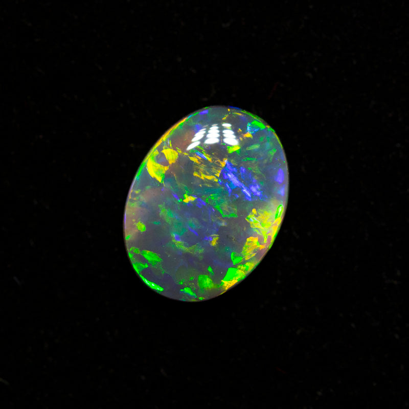 0.47 ct black opal 6.9x5.2x1.9mm