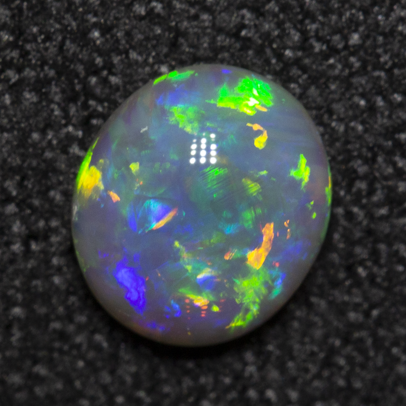 0.48 ct double-sided crystal opal 6x5.2x2.5mm