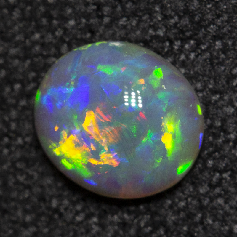 0.48 ct double-sided crystal opal 6x5.2x2.5mm