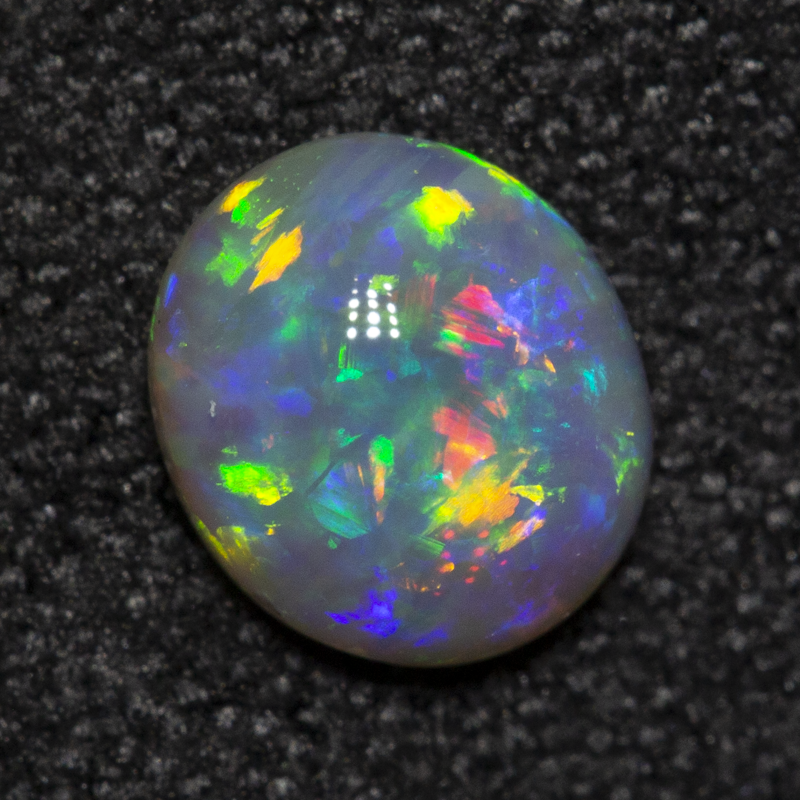 0.48 ct double-sided crystal opal 6x5.2x2.5mm