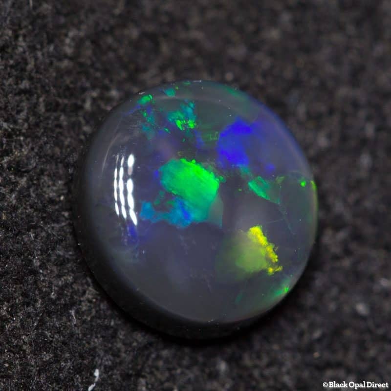 0.48 ct black opal 5mm round x 2mm