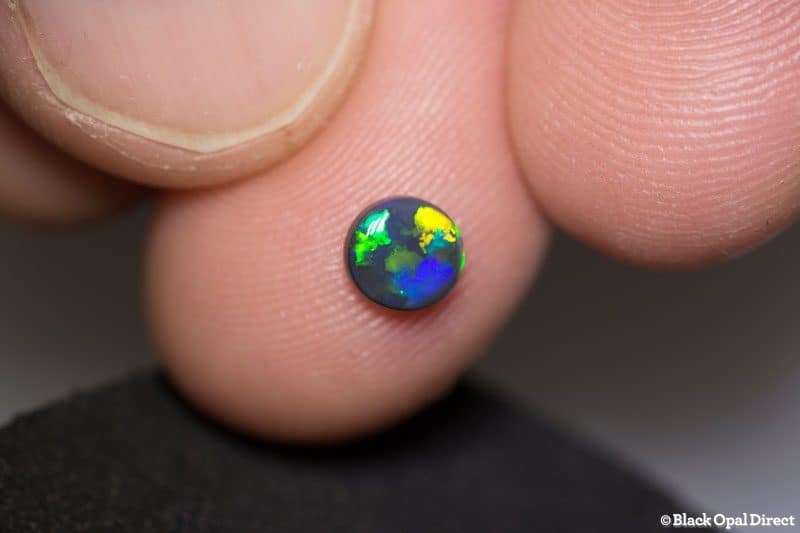 0.48 ct black opal 5mm round x 2mm