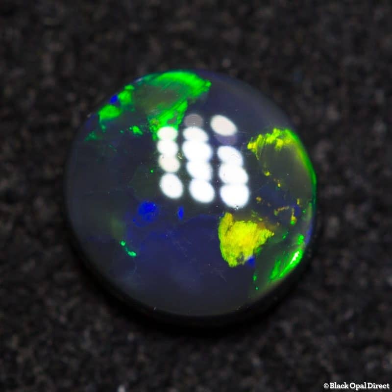 0.48 ct black opal 5mm round x 2mm