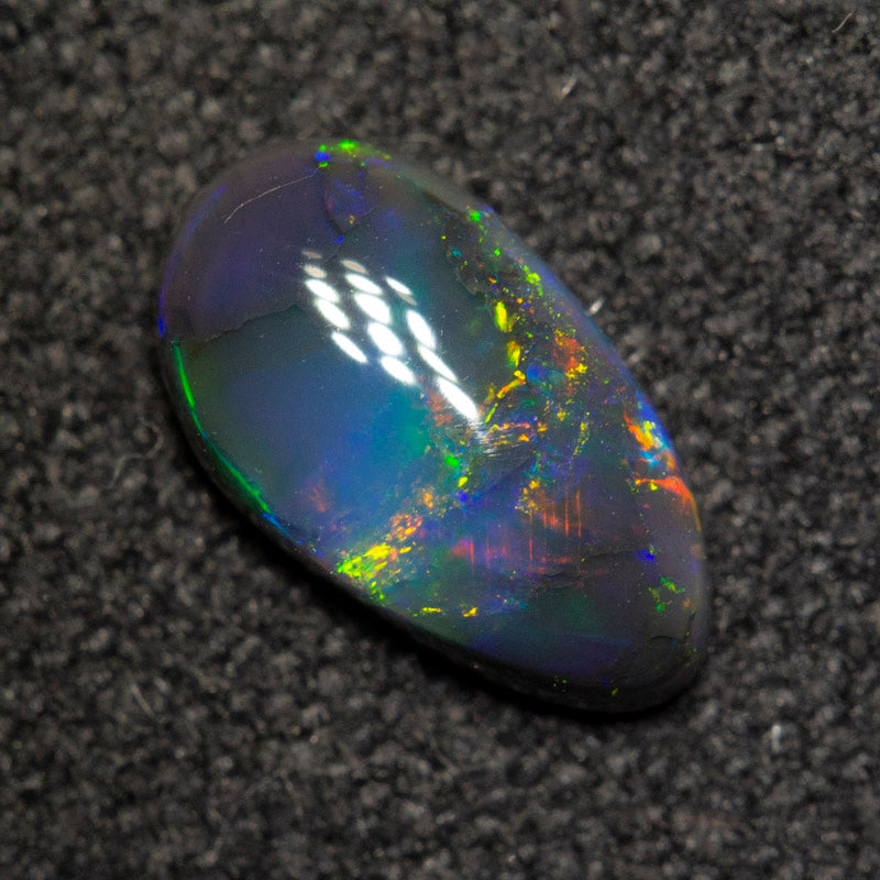 0.49 ct black opal 7.9x4.5x2.2mm