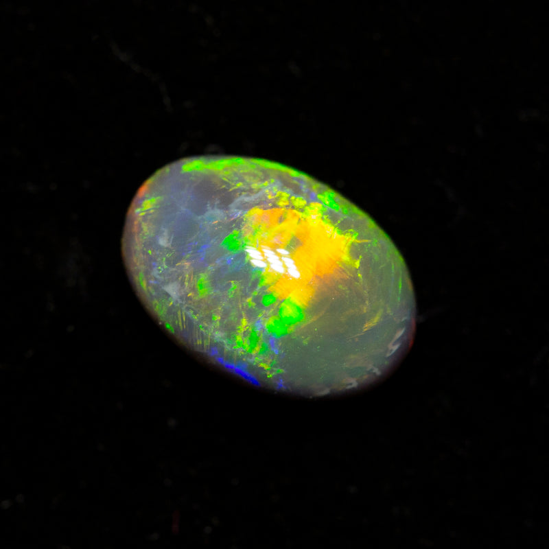 0.49 ct black opal 6.5x4.6x2.8mm