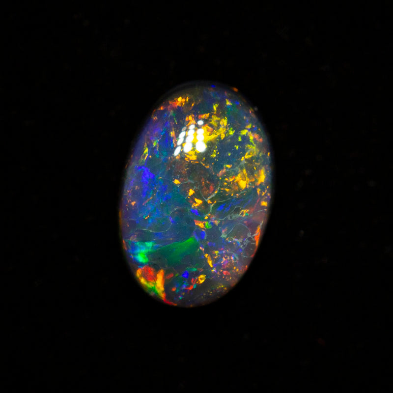 0.49 ct black opal 6.4x4.3x2.6mm