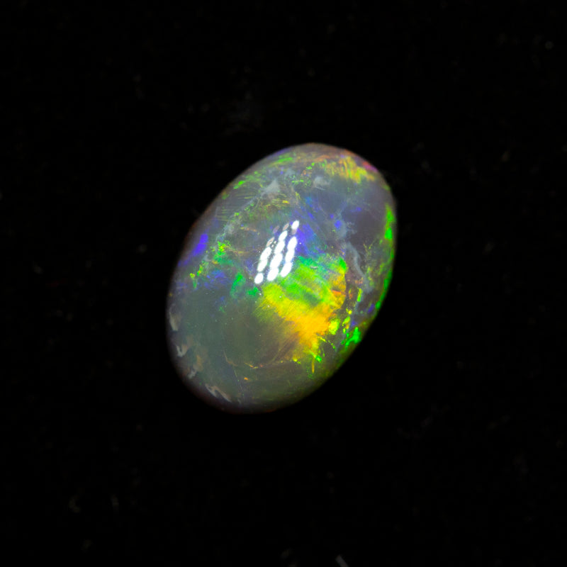 0.49 ct black opal 6.5x4.6x2.8mm