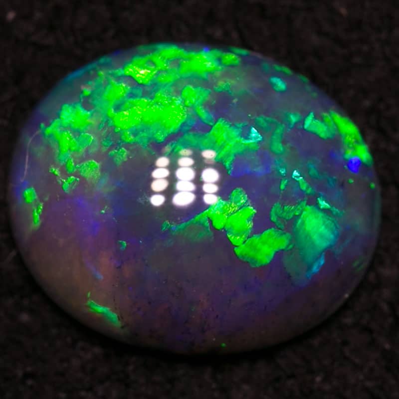 0.50 ct dark crystal opal 6.5x5x2mm