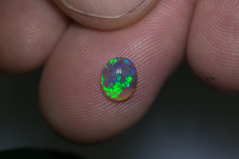 0.50 ct dark crystal opal 6.5x5x2mm