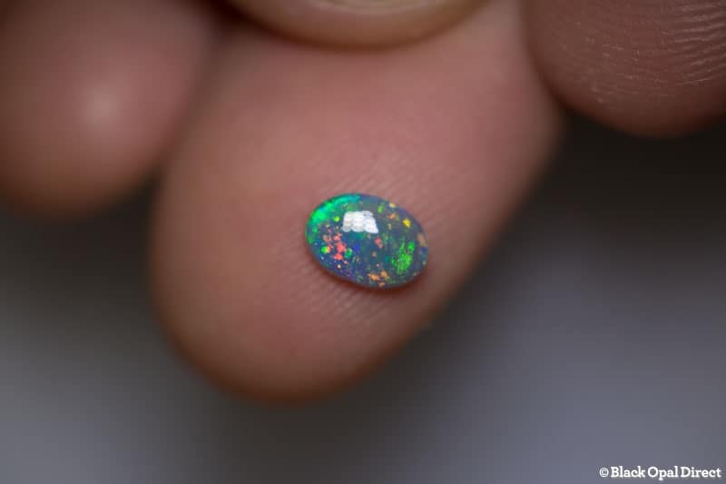 0.50 ct semi black opal 6.5x4.5x2mm