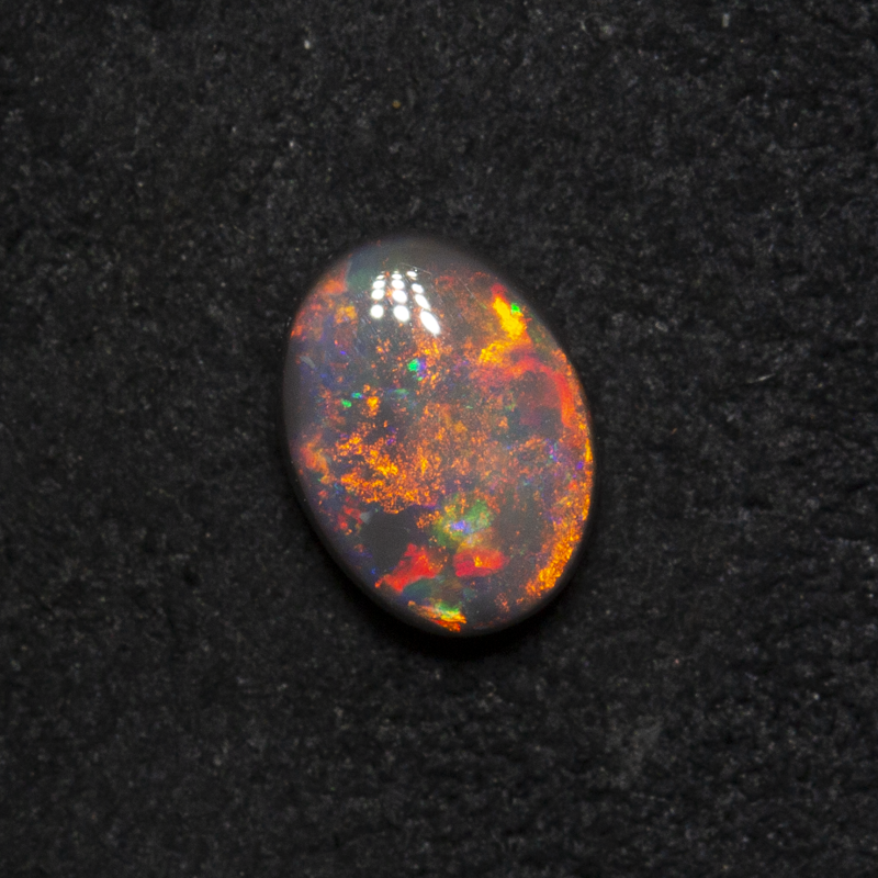 0.51 ct dark opal 6.1x4.5x2.7mm