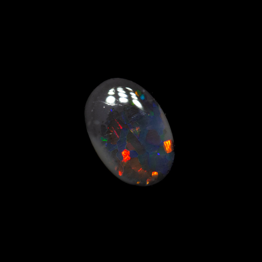 0.52 ct black opal 7x4.8x2.1mm