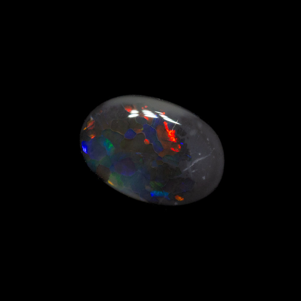 0.52 ct black opal 7x4.8x2.1mm