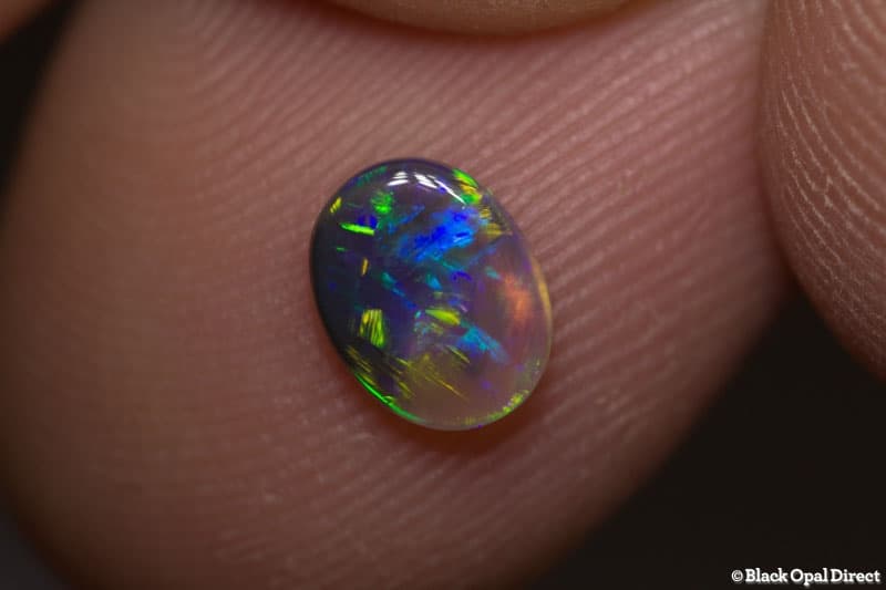 0.52 ct semi black opal 7x5x2mm