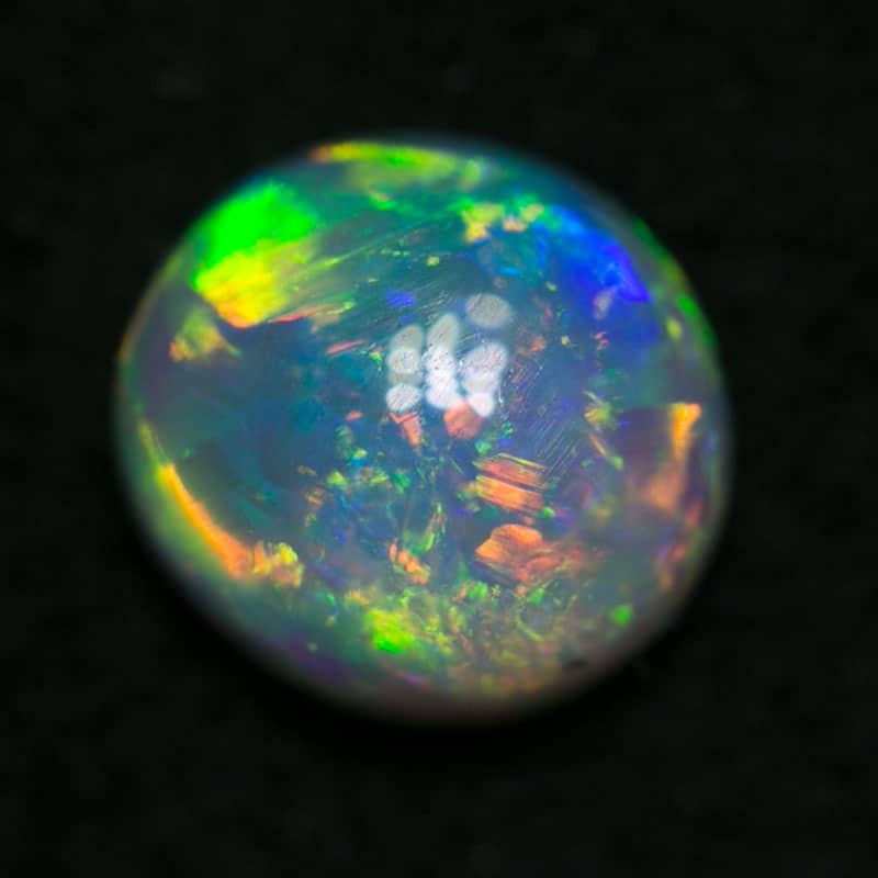0.52 ct crystal opal 5mm round x 2.5mm