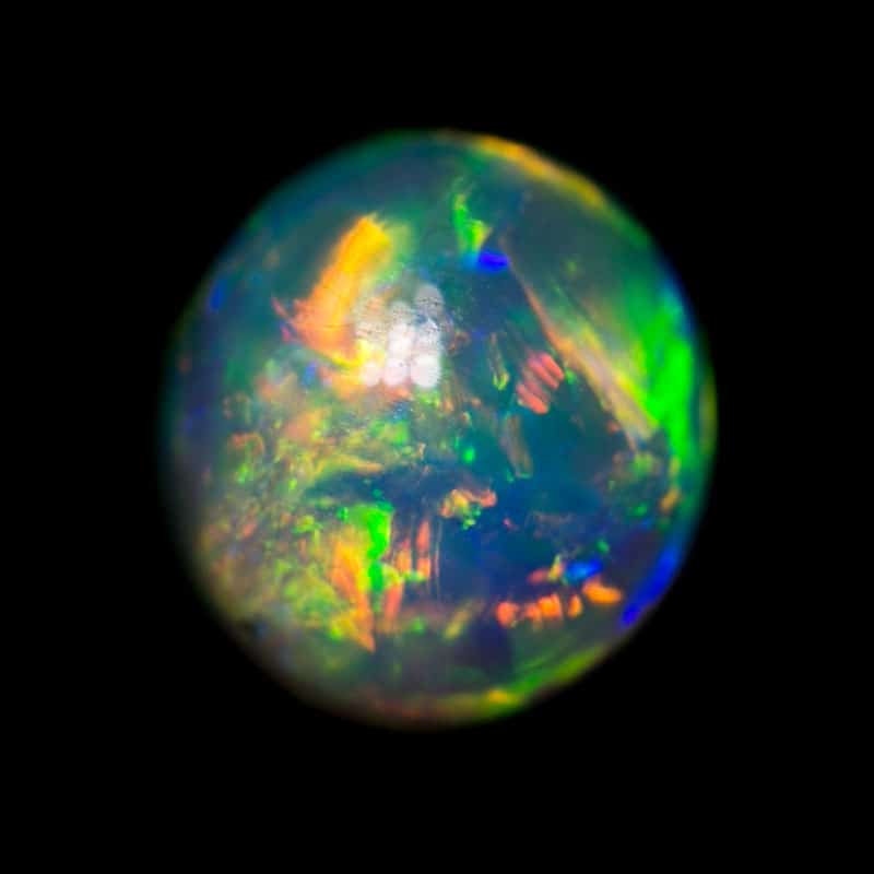 0.52 ct crystal opal 5mm round x 2.5mm