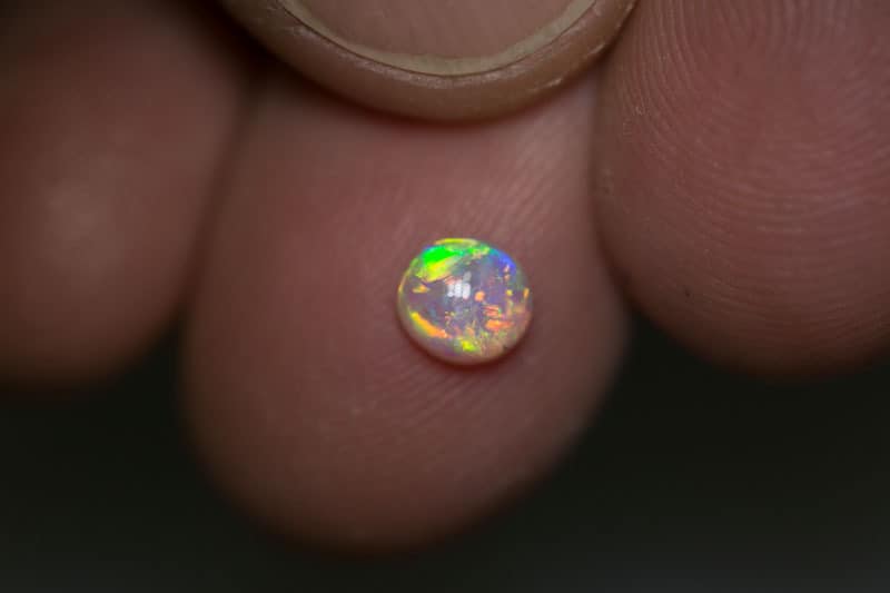 0.52 ct crystal opal 5mm round x 2.5mm