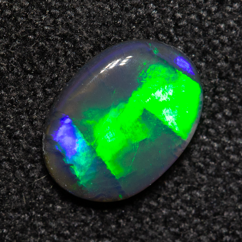0.53 ct black opal 7.2x5.3x2mm